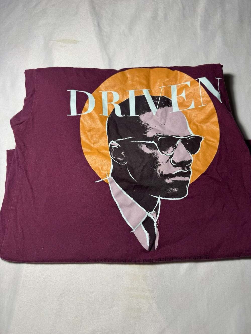 Malcolm X 'Driven' Maroon Graphic T-Shirt Civil Rights Leader